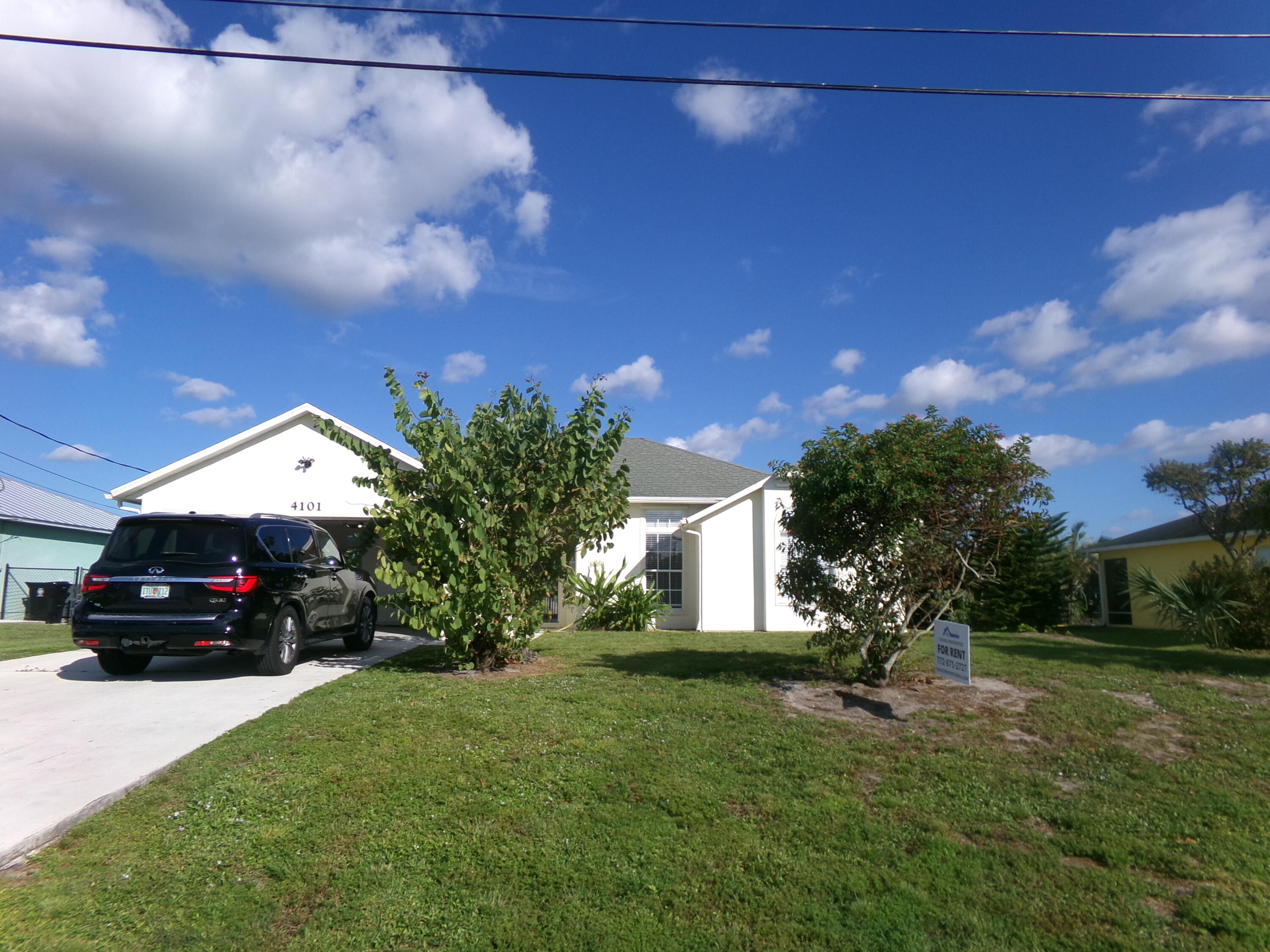 a view of a car in front of house