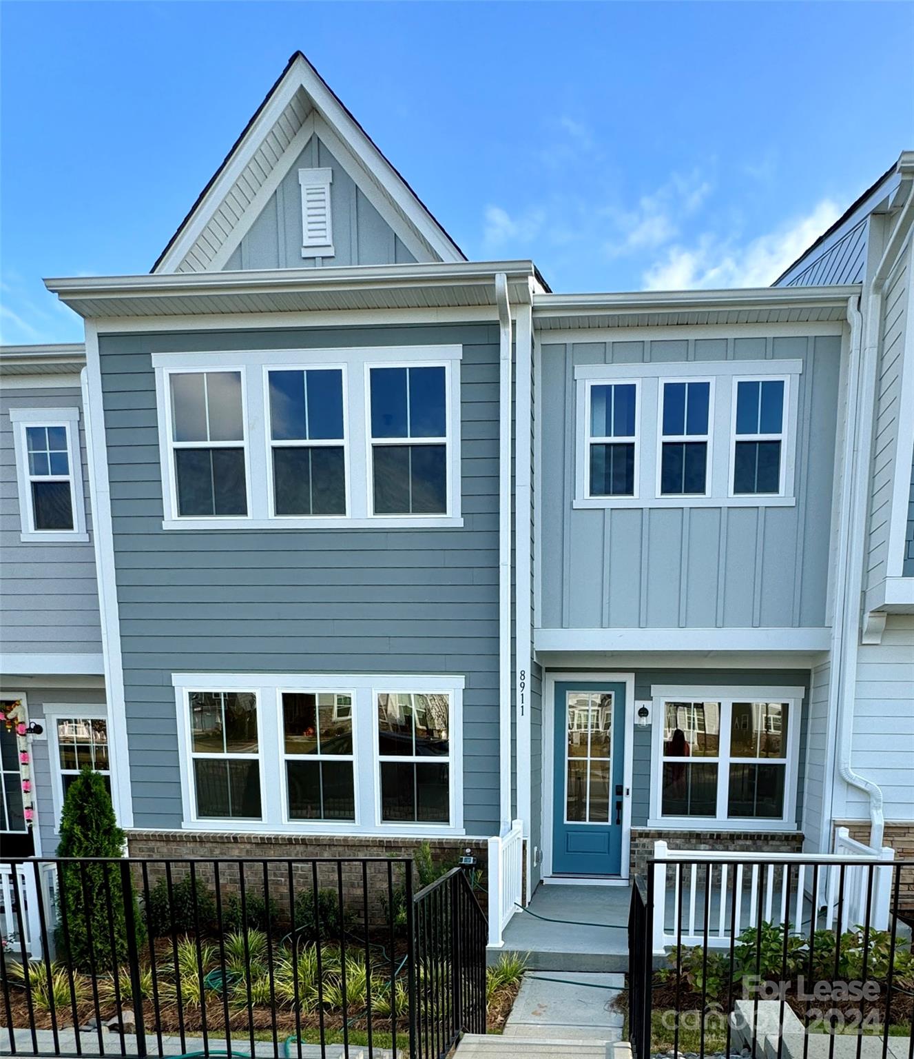 a front view of a house and a yard