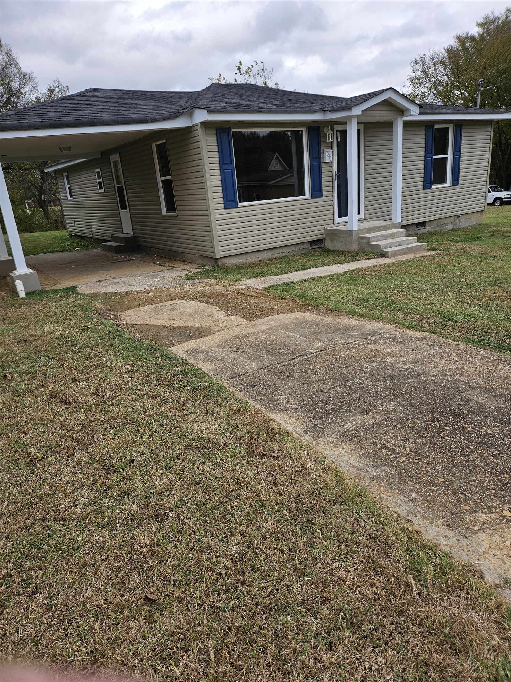 a view of house with outdoor space