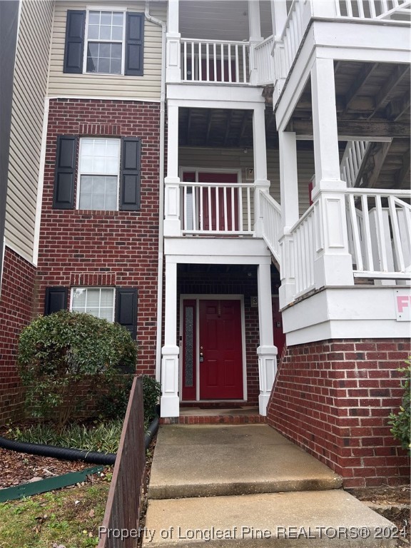 a front view of a house with balcony