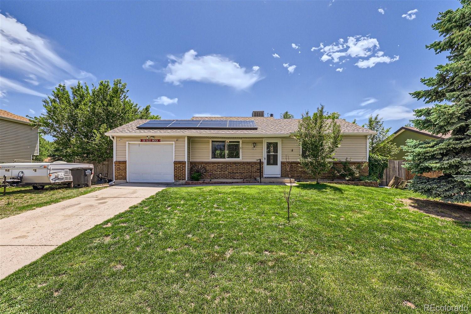 a house view with a garden space