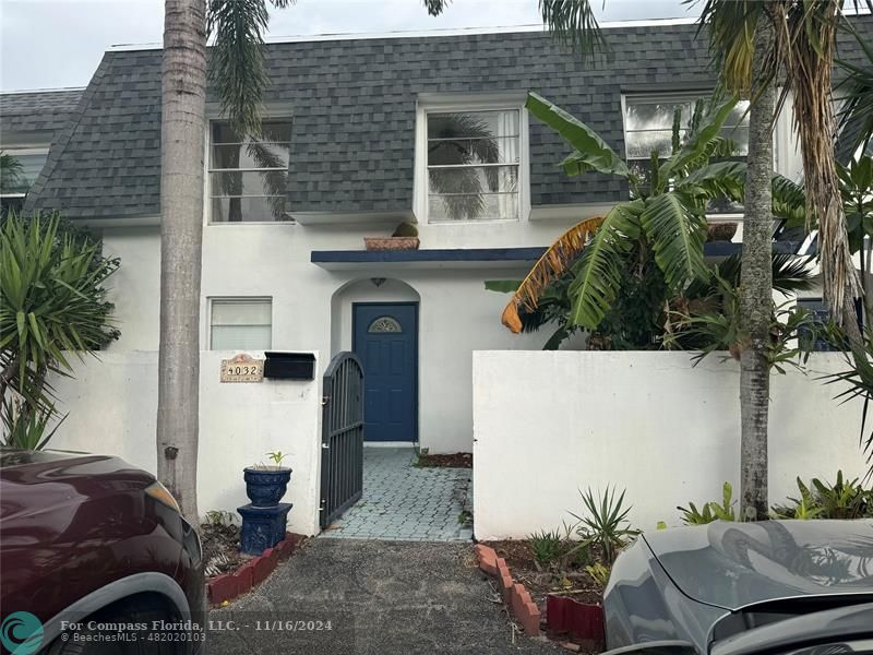 a view of multiple house with a yard