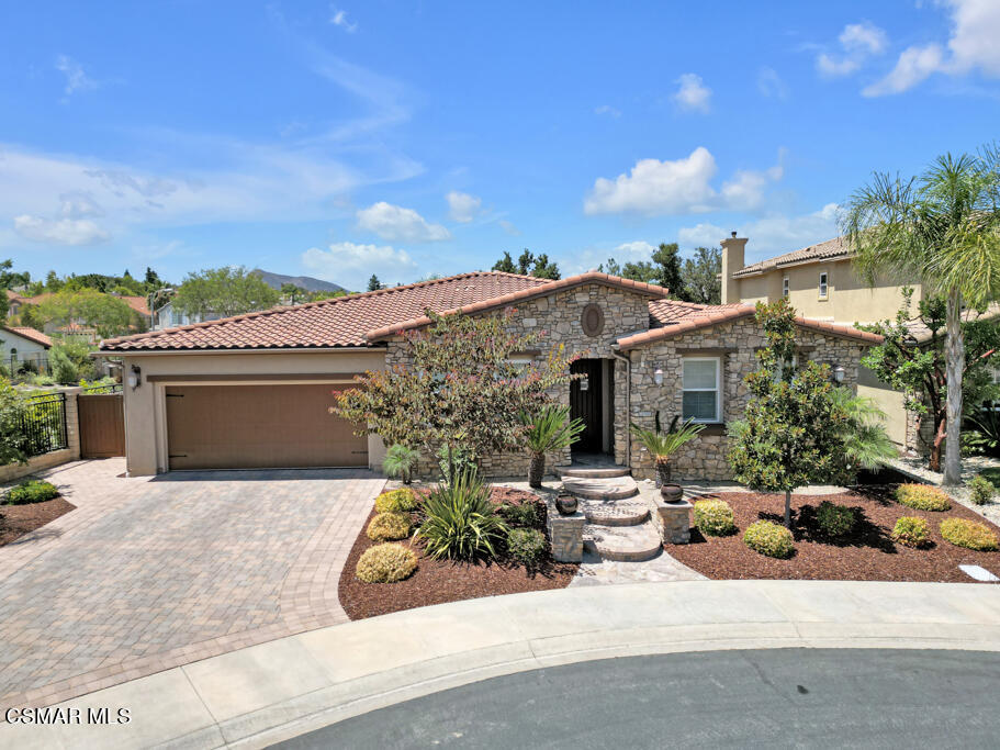 front view of a house with a patio