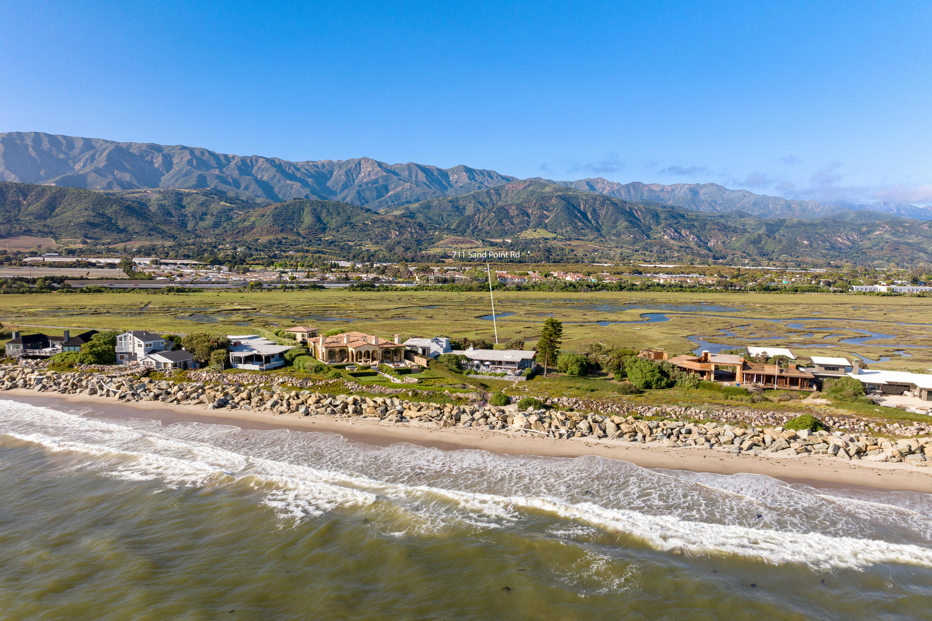 a view of a city with an ocean beach