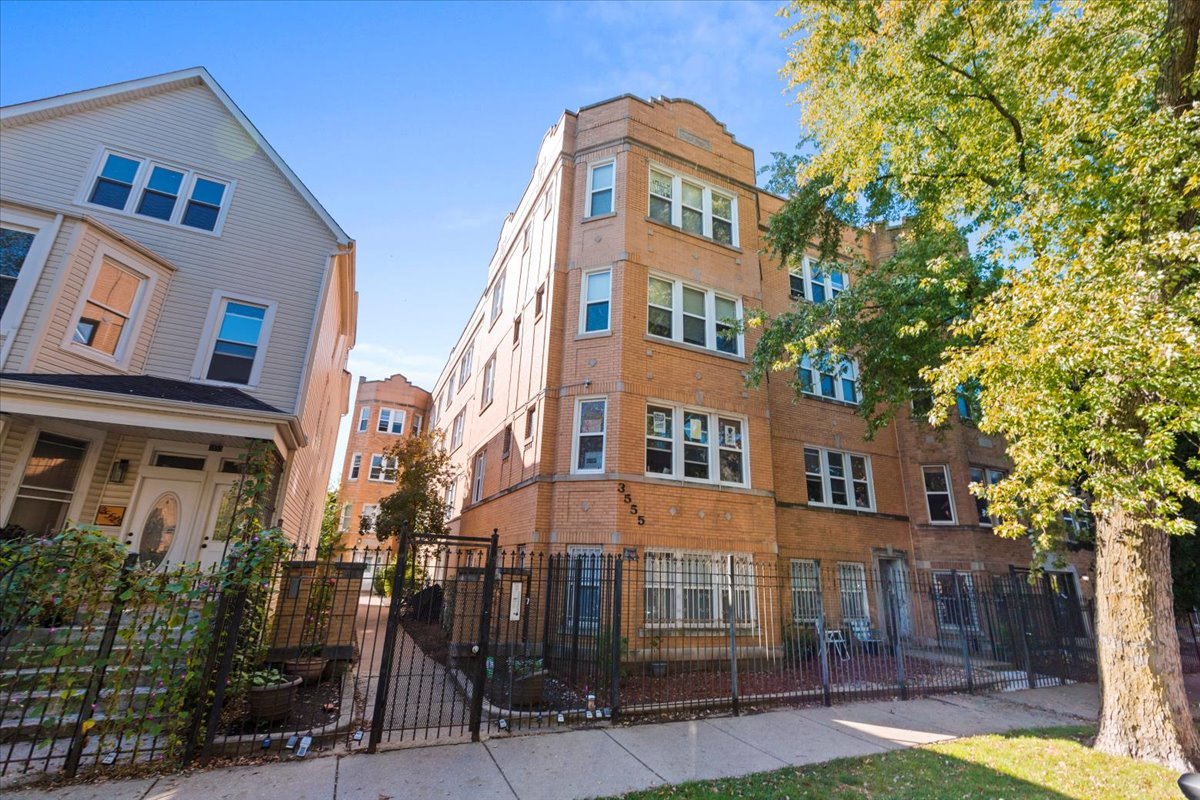 a front view of a multi story residential apartment building