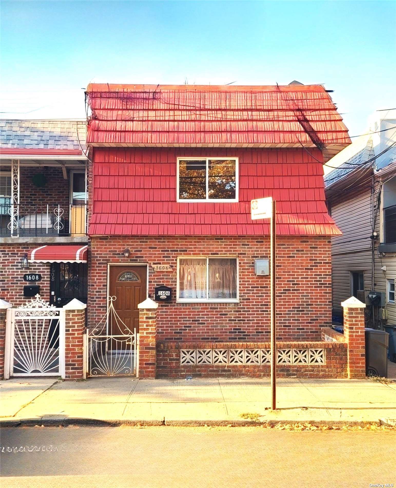 a view of a house with small yard