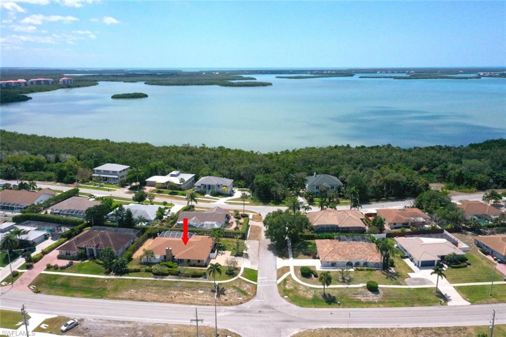 a view of lake and houses with outdoor space