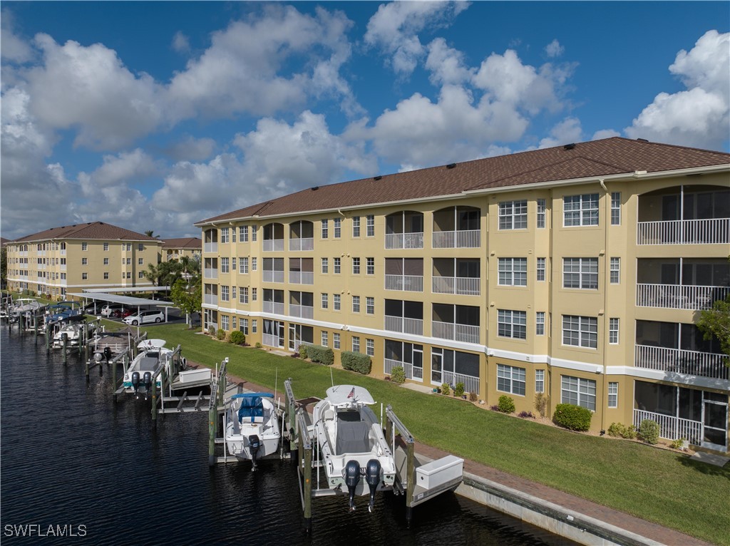 a front view of a building with outdoor space