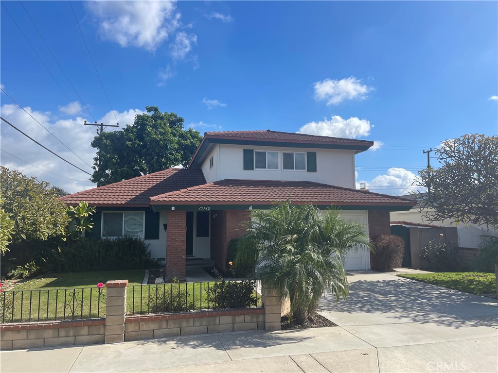 a front view of a house with a porch