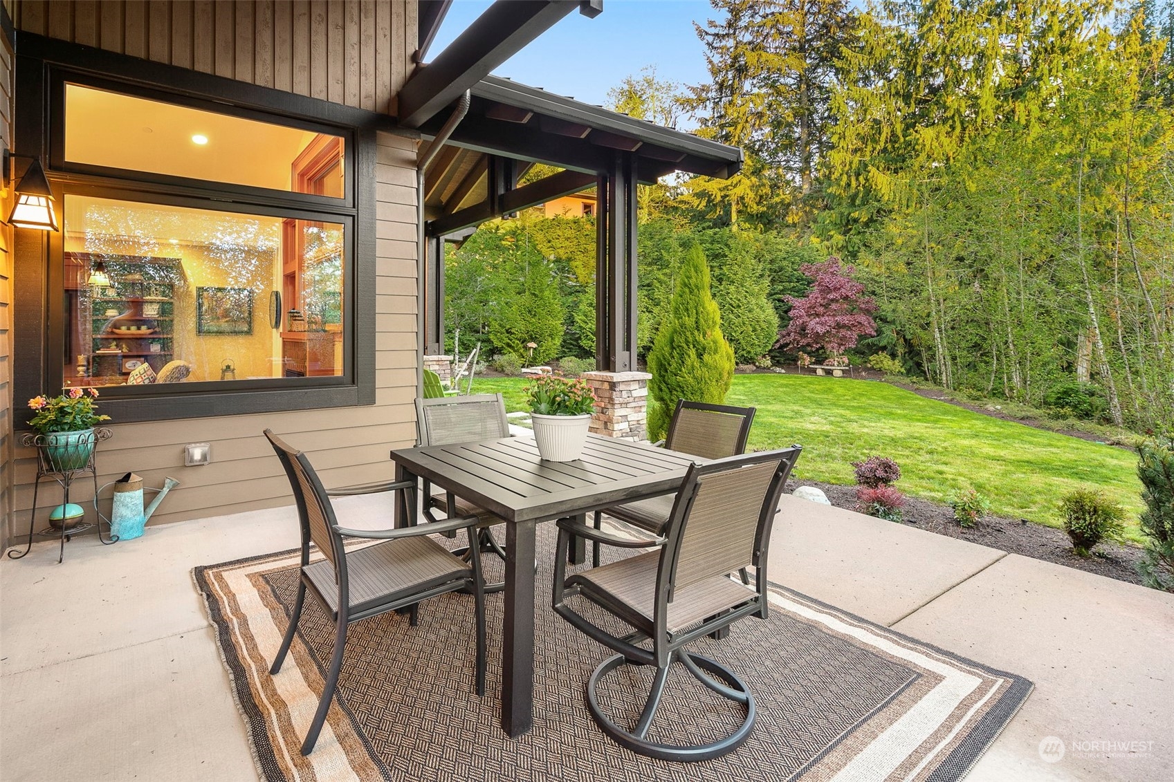 a view of a patio with a table chairs and a table