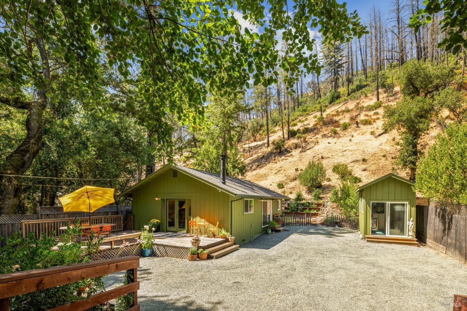 This apx. .28 acre spot is a little over a mile to wine country's amenities. The serene site offers sunshine, shade, established gardens and access to the creek.