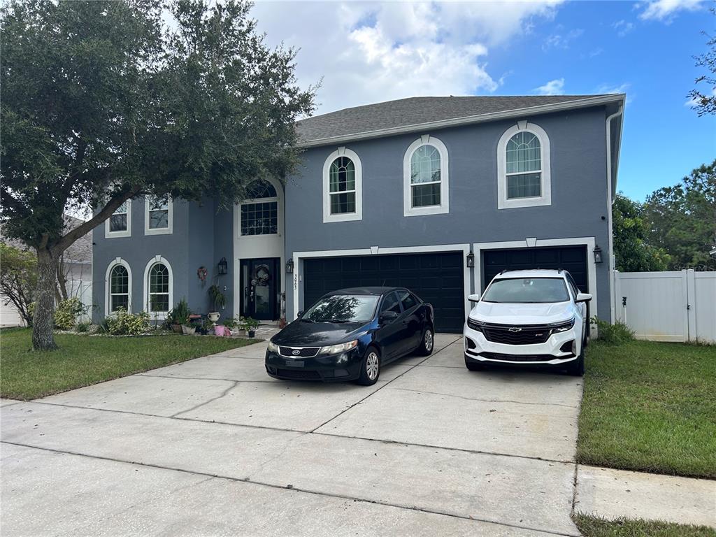 a car parked in front of a house