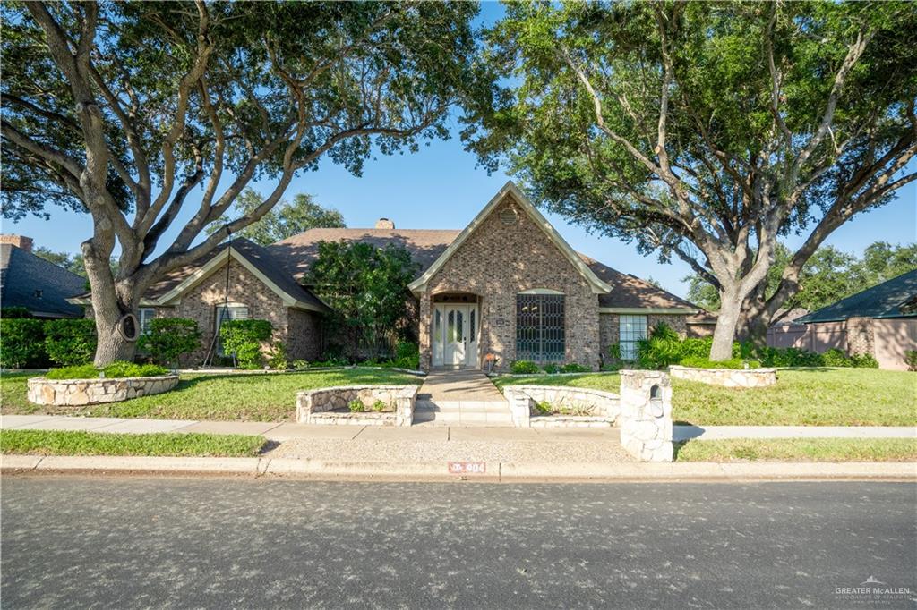 View of front of property with a front lawn