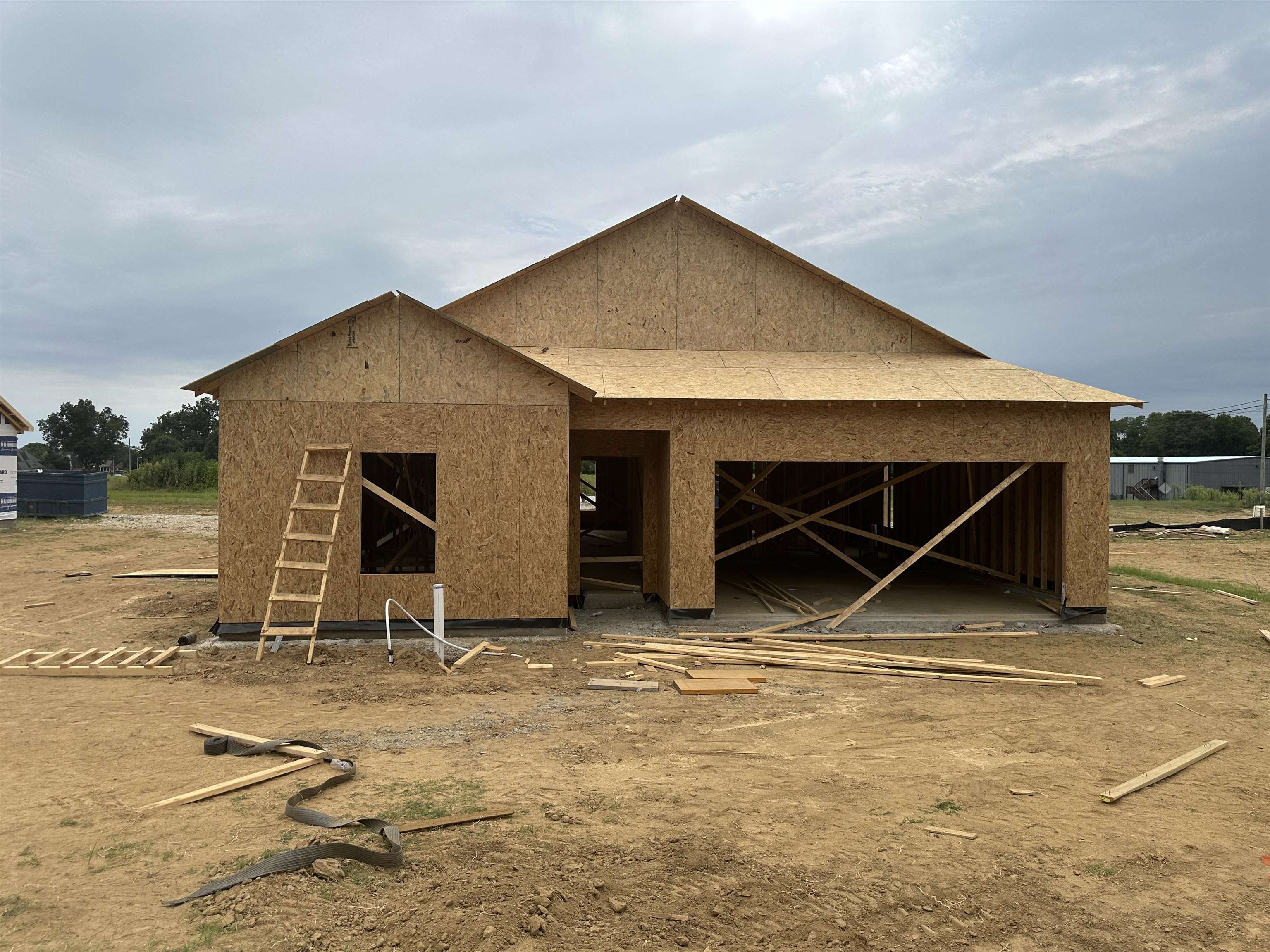 View of front of property with an outbuilding