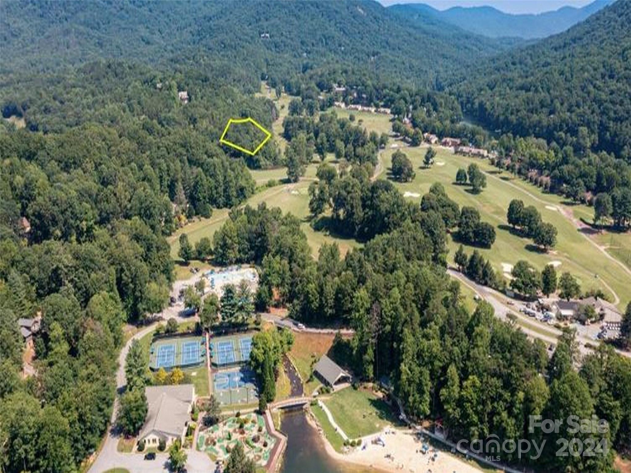 an aerial view of house with yard