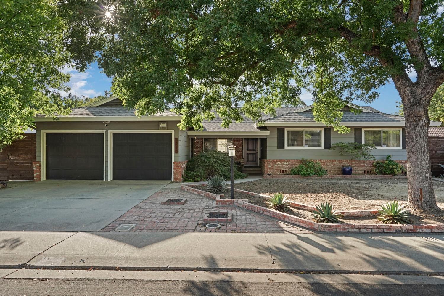 front view of a house with a patio