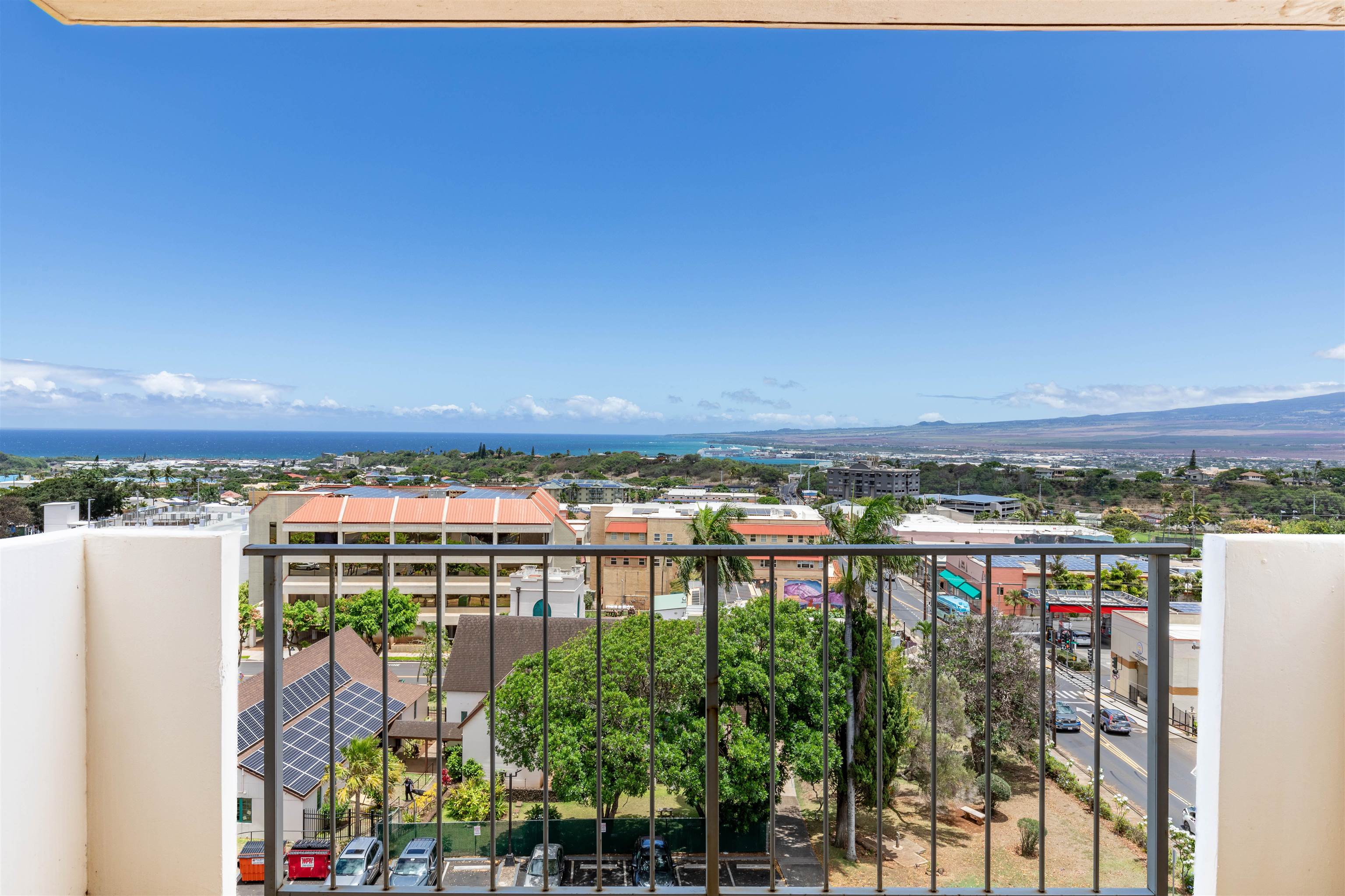 a view of a balcony with city view