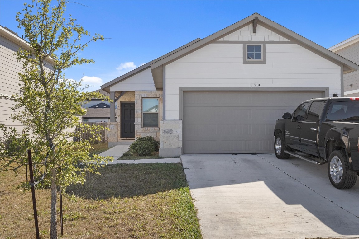 a view of a car in front of a house