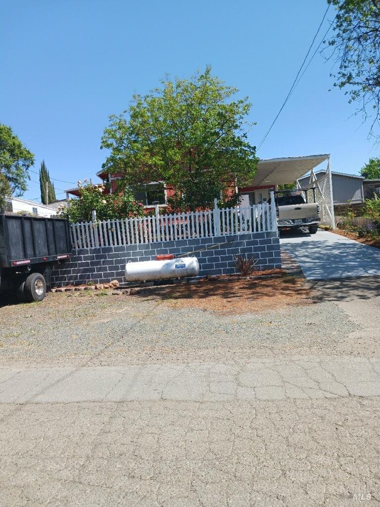 a view of a deck with a fence