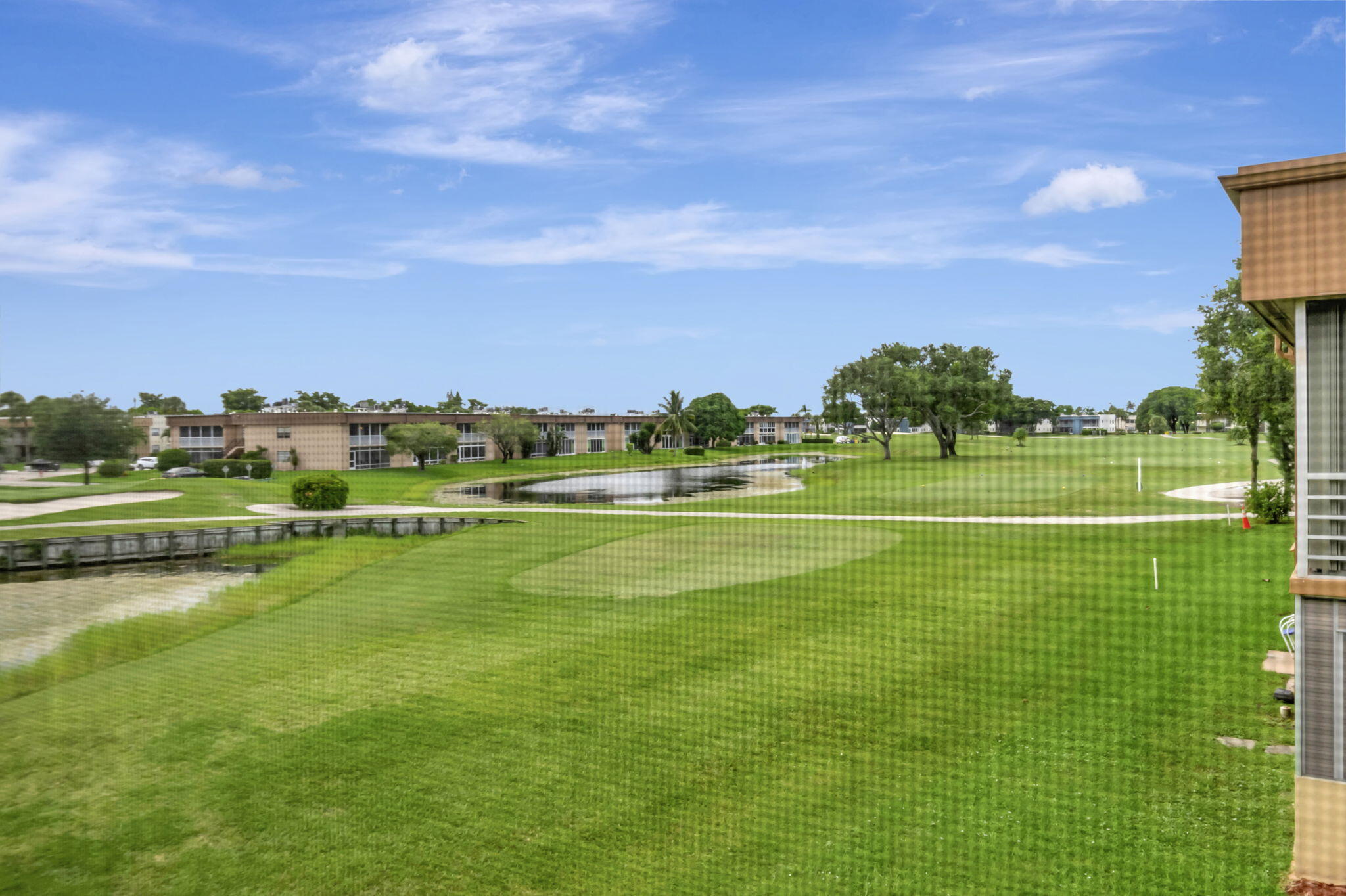 a view of a lake with a big yard