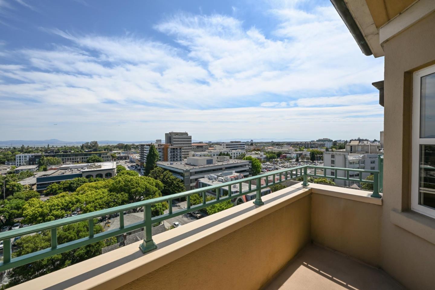 a view of a city skyline from a balcony