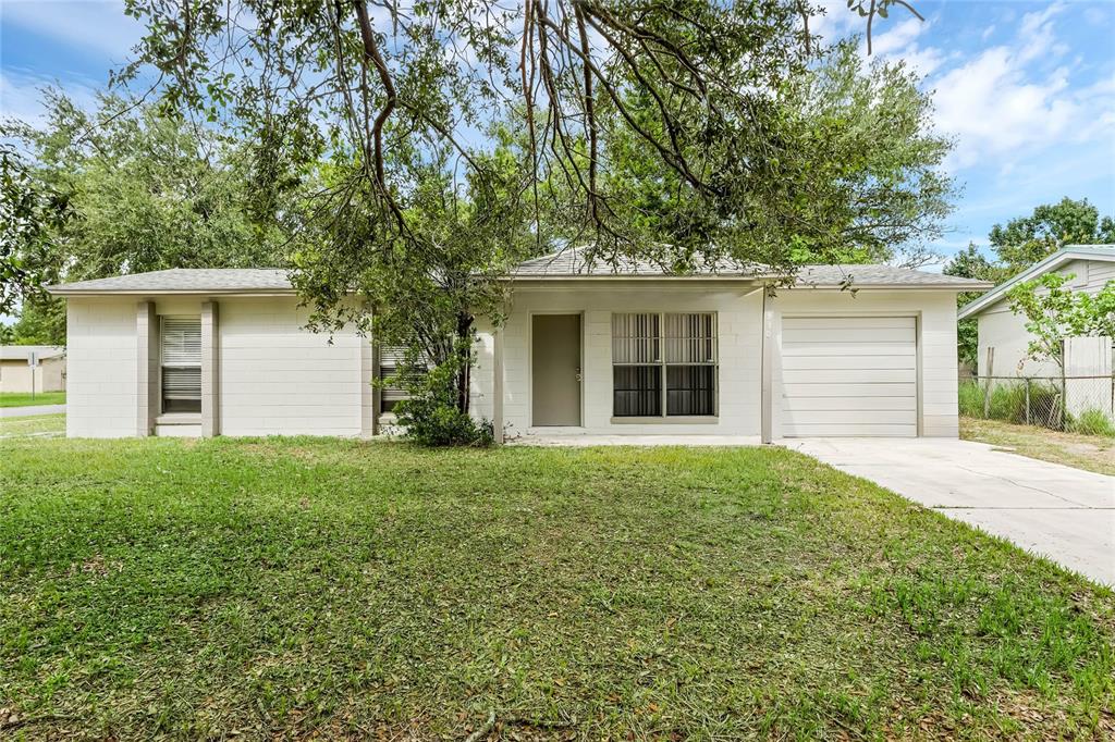 front view of a house with a yard