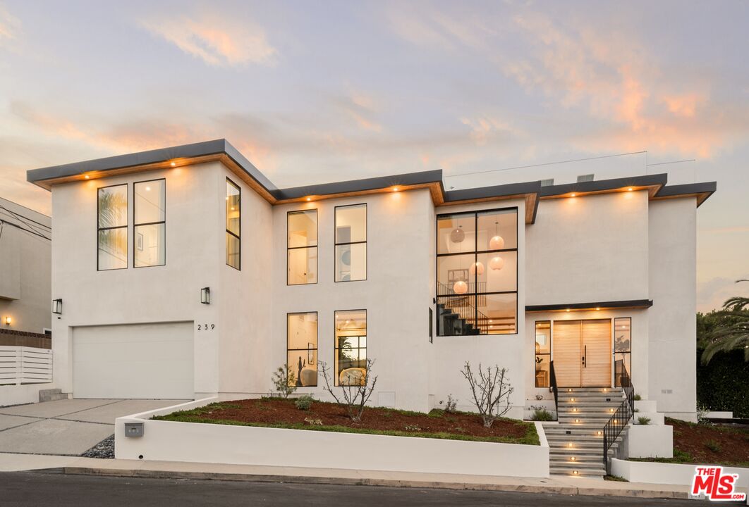 a house view with a outdoor space