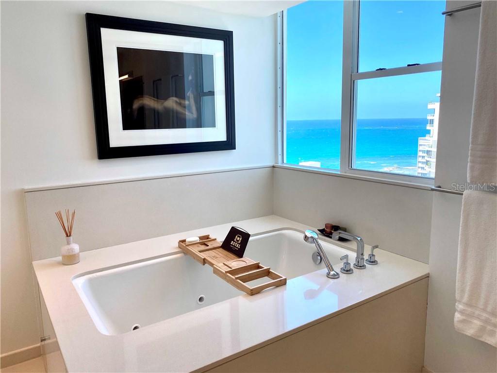 a bathroom with a sink and a bathtub