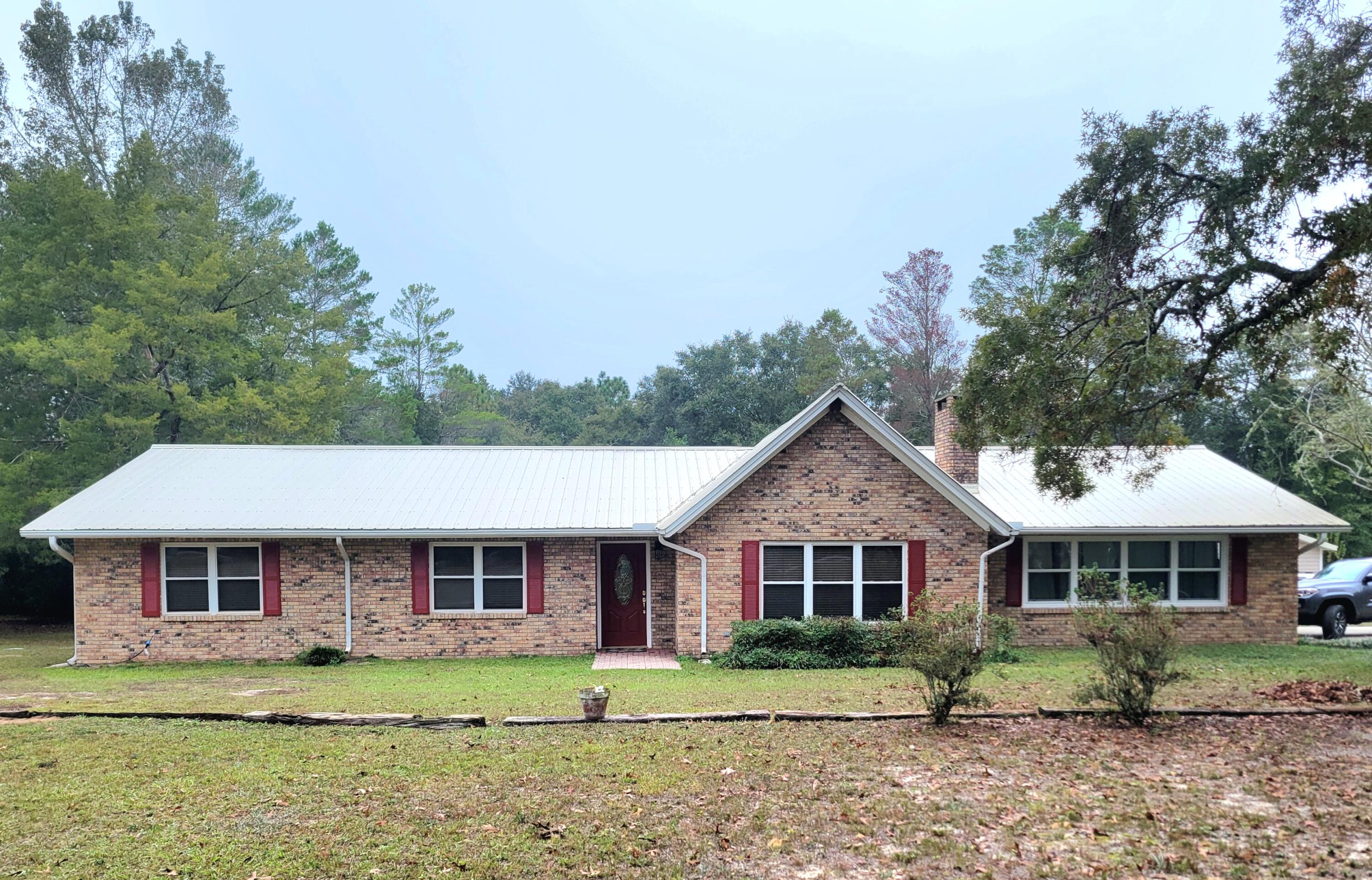 a front of a house with a yard