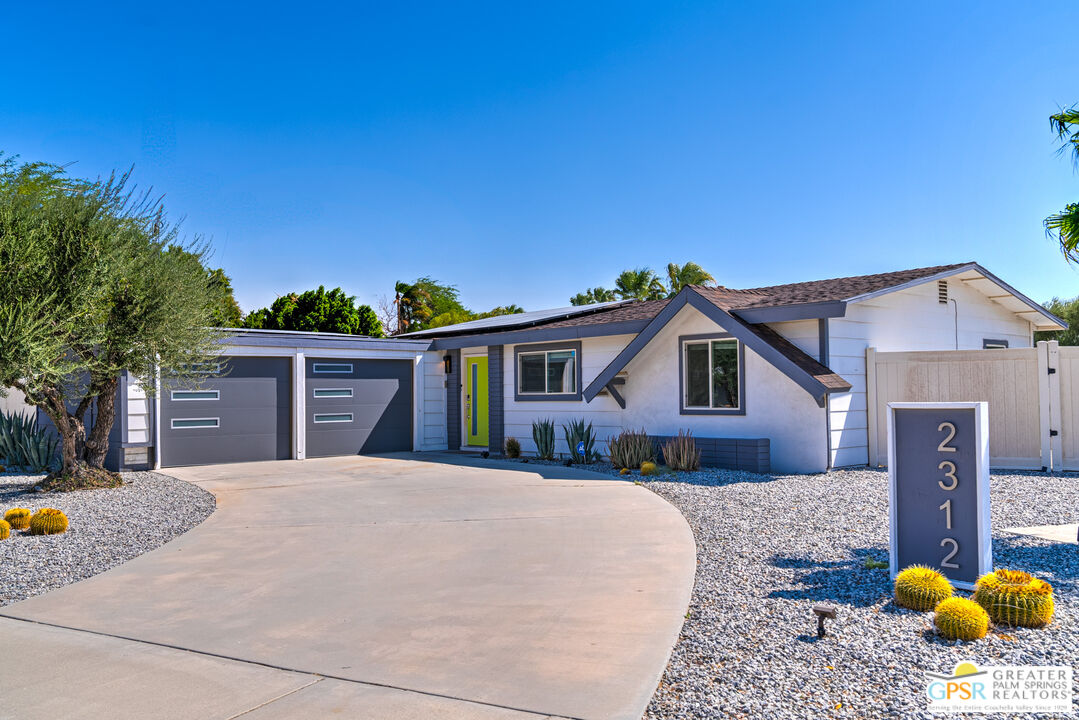 a house view with a outdoor space