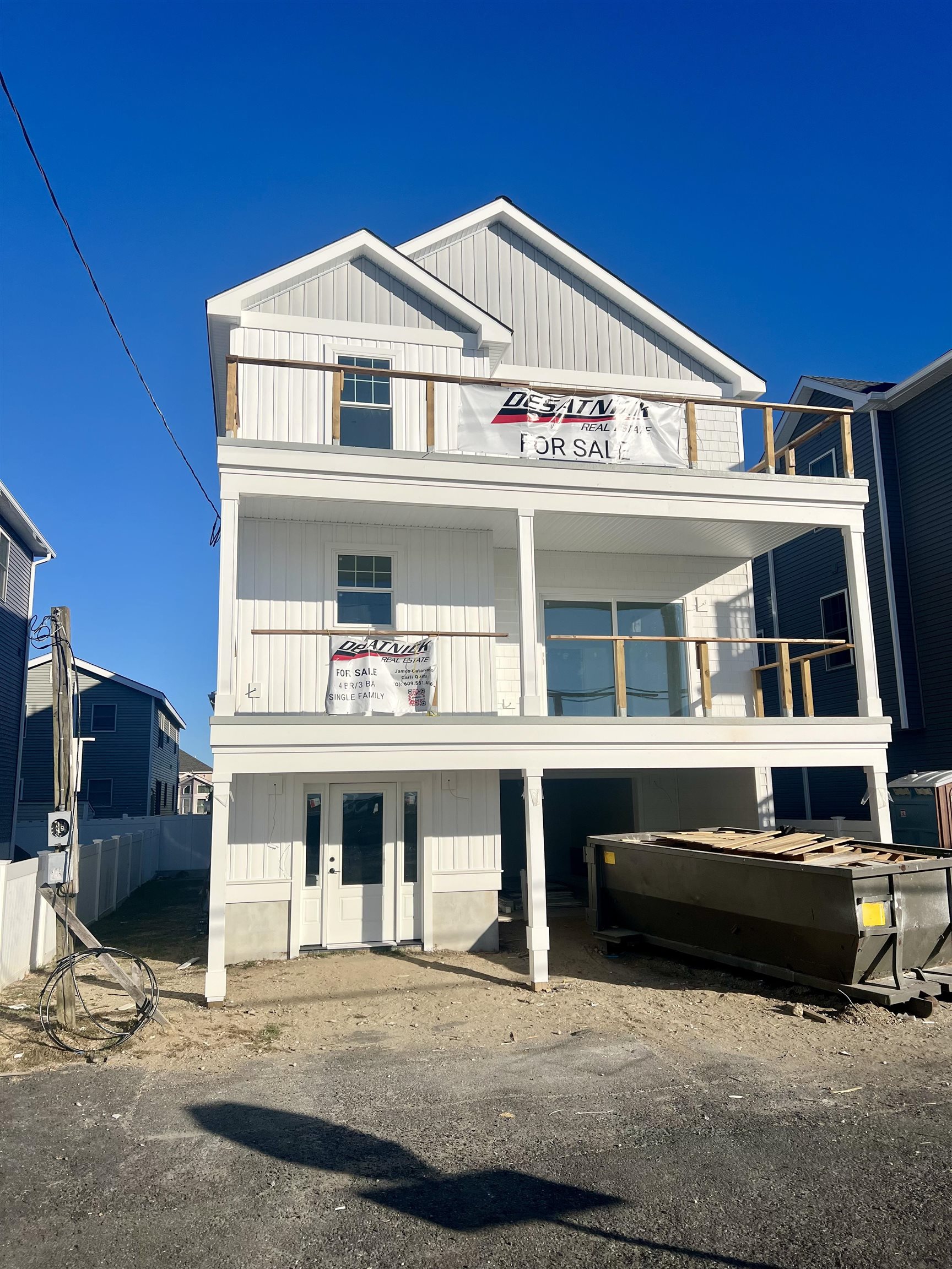 a front view of a house with a porch