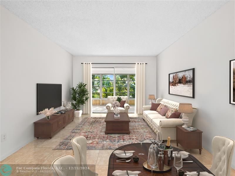 a living room with furniture window and a flat screen tv