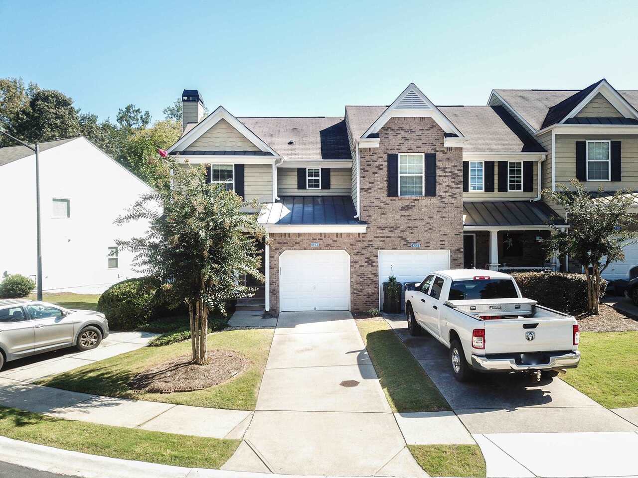 a aerial view of a house with a yard