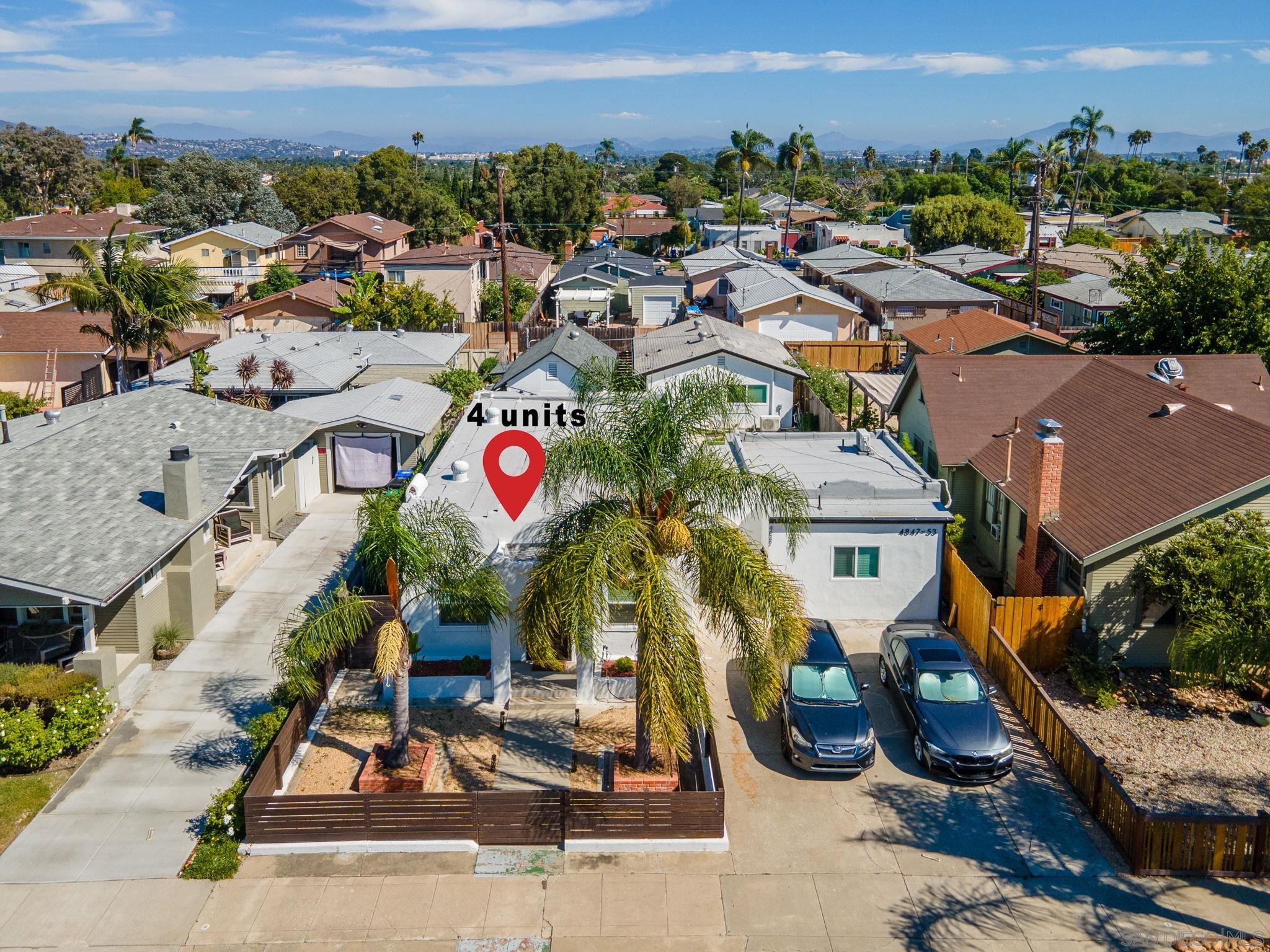 an aerial view of multiple house