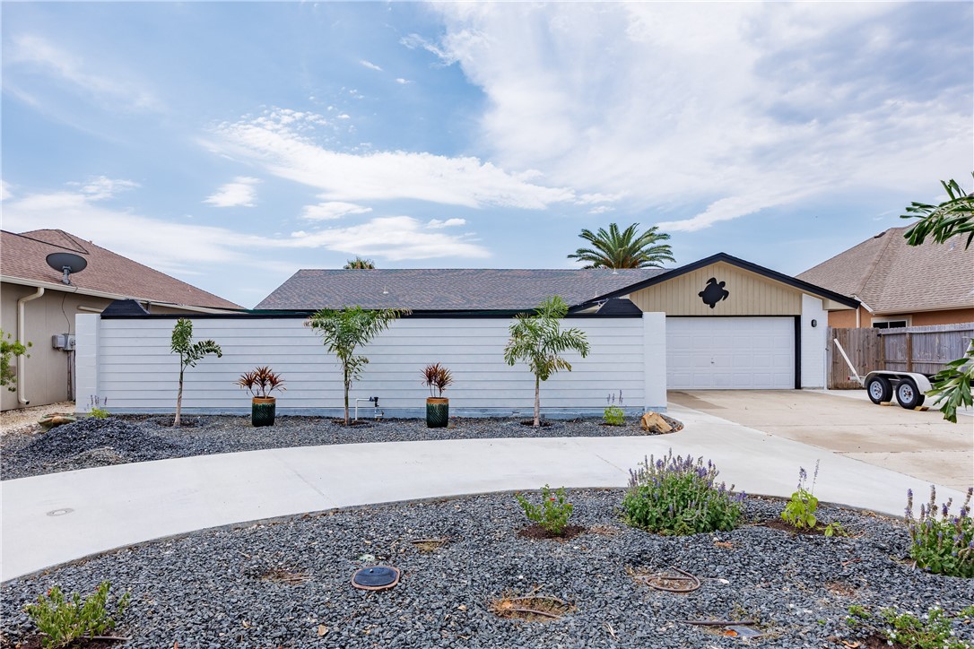 a house view with a backyard space