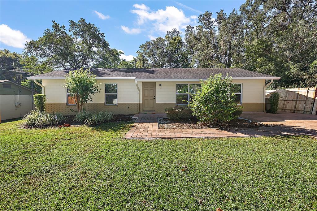 front view of a house with a yard