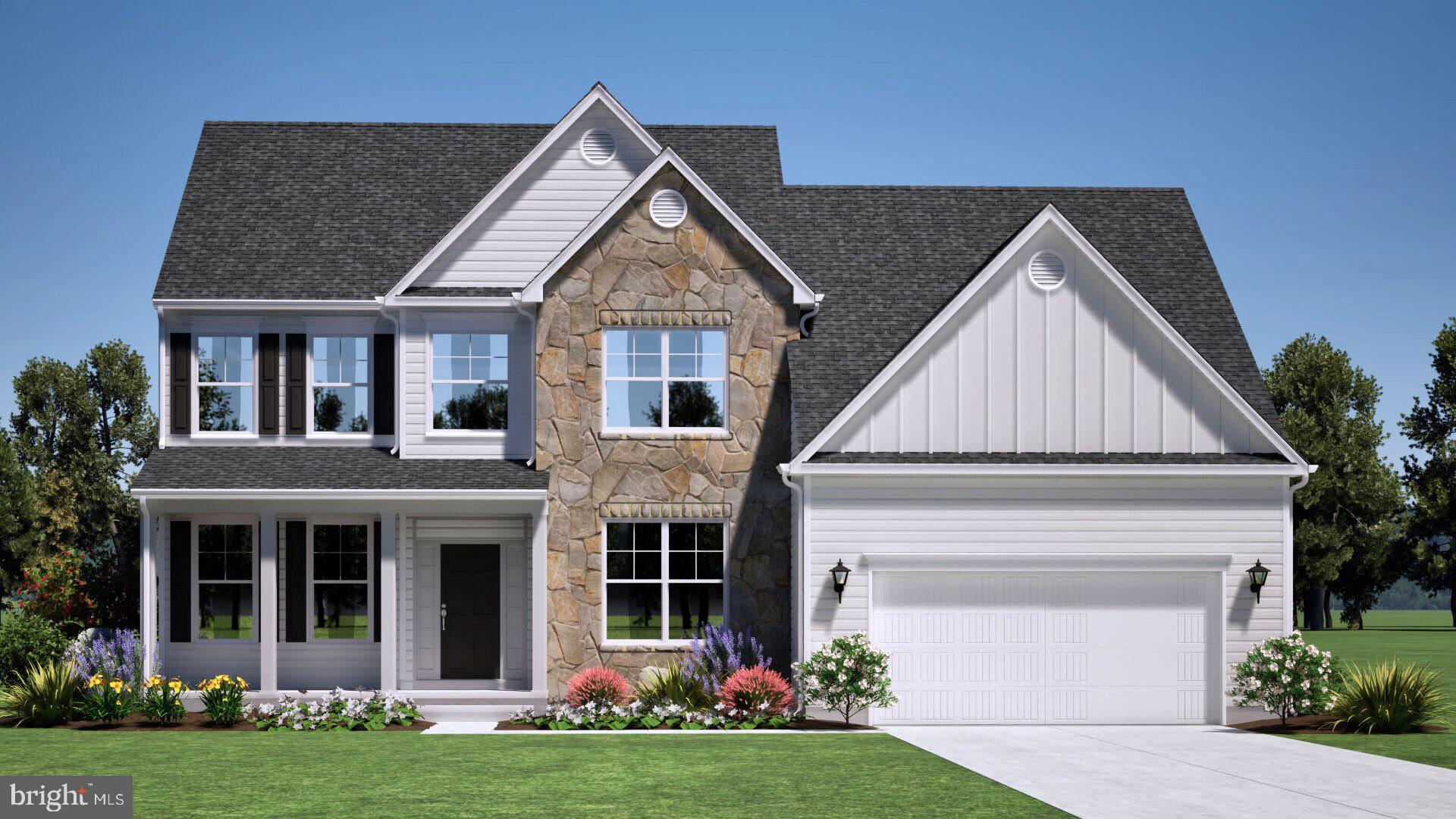 a view of house with yard