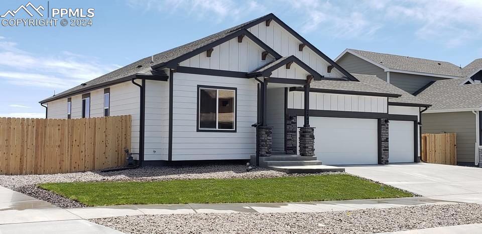 View of front facade with a garage