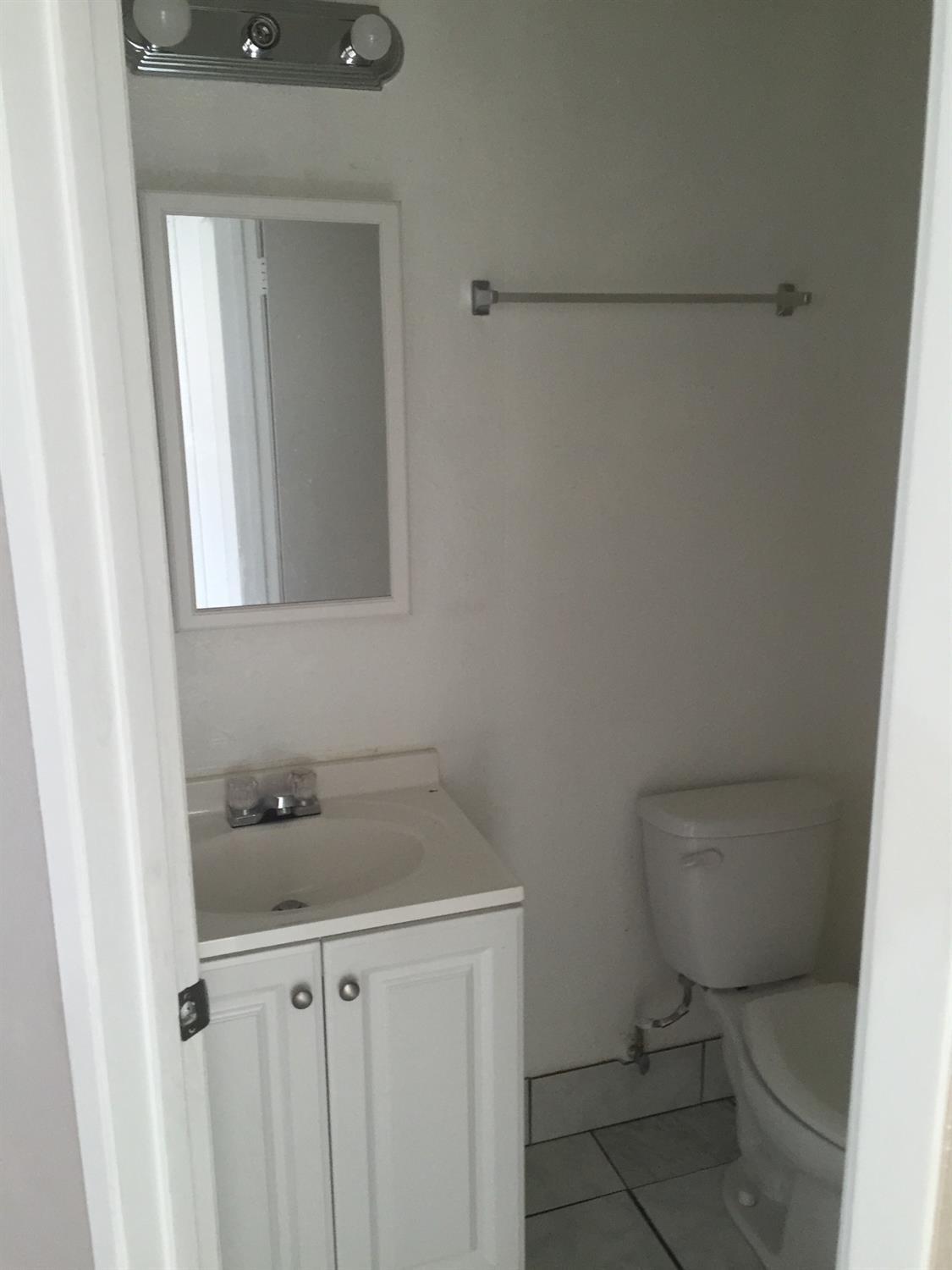 a bathroom with a sink and a toilet