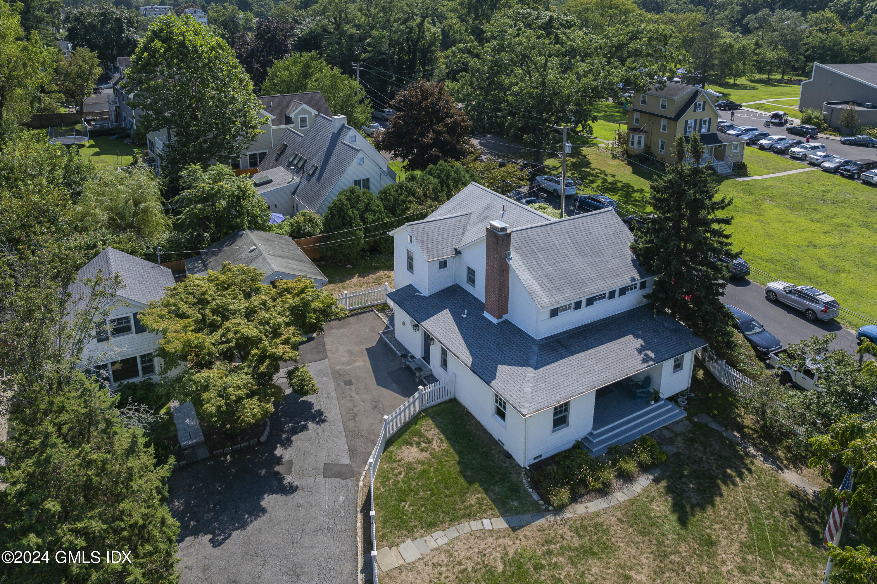 an aerial view of a house with a garden