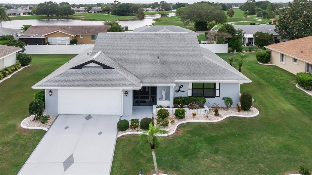 an aerial view of a house with garden