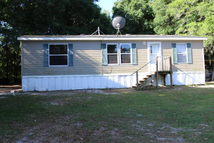 a view front of house with a yard