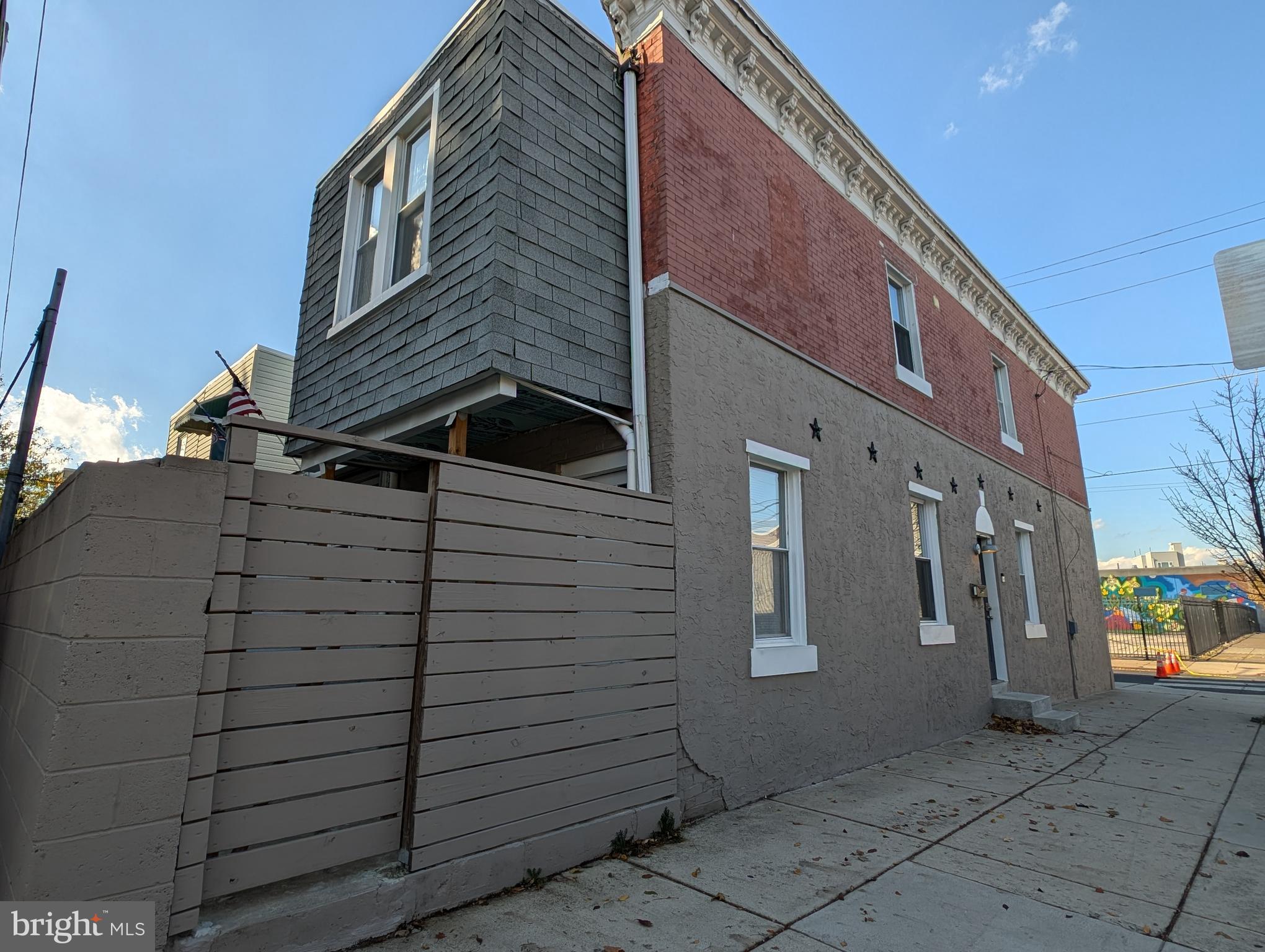 a view of a house with a street