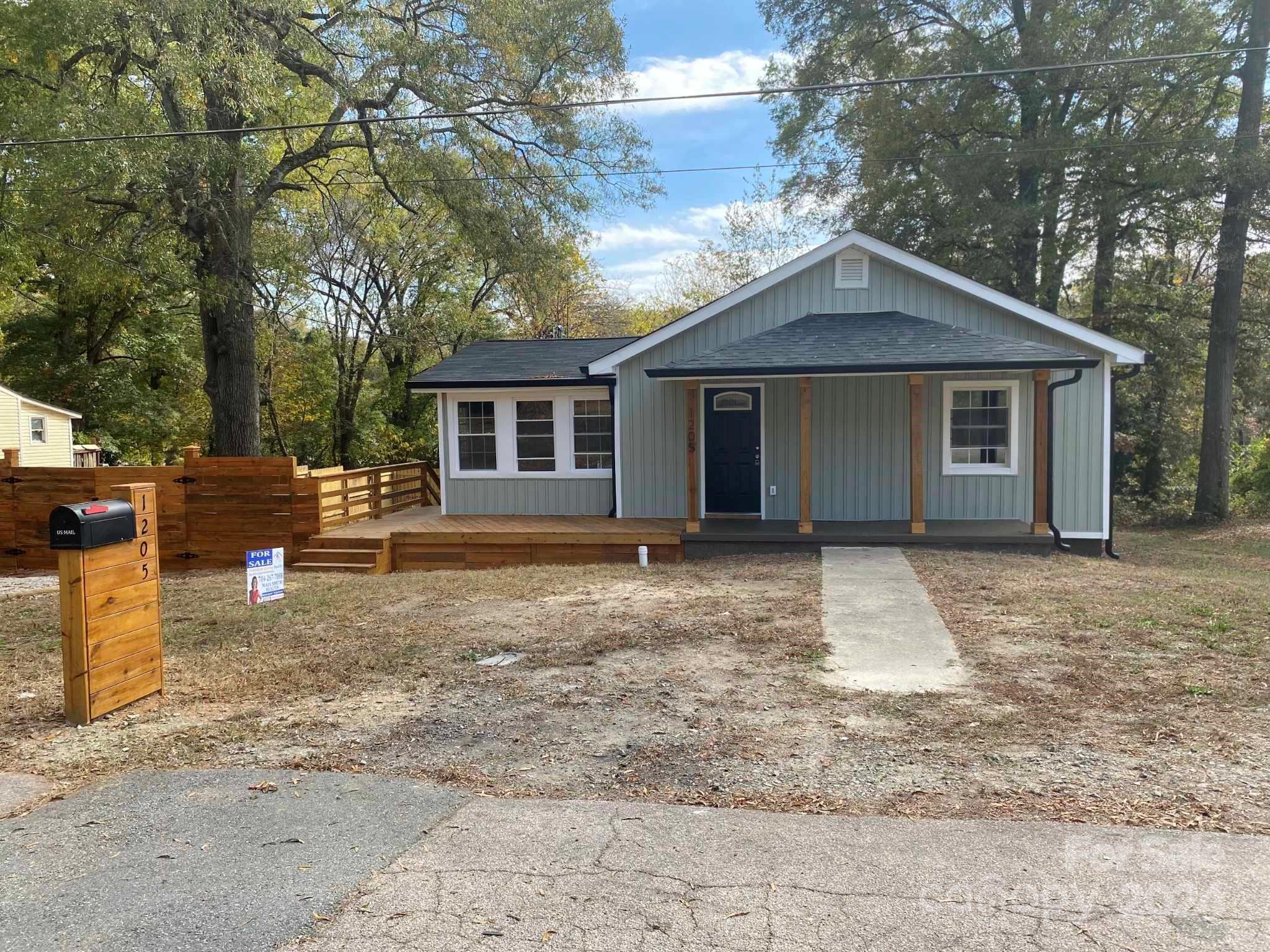 a front view of a house with yard