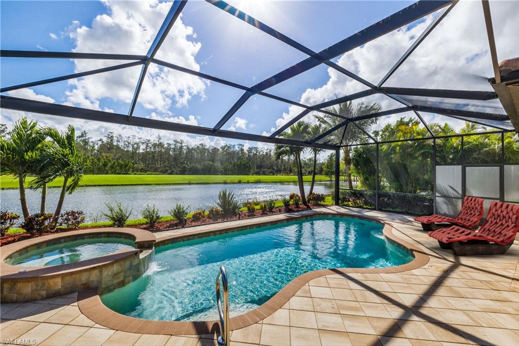 a view of a swimming pool with a patio