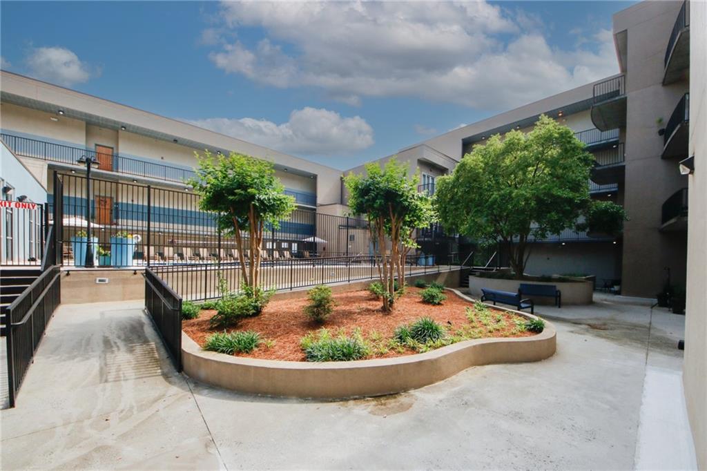 a view of a swimming pool with a patio