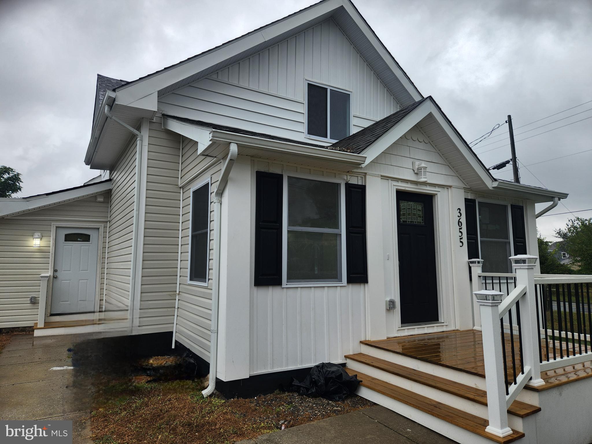 a front view of a house with a porch