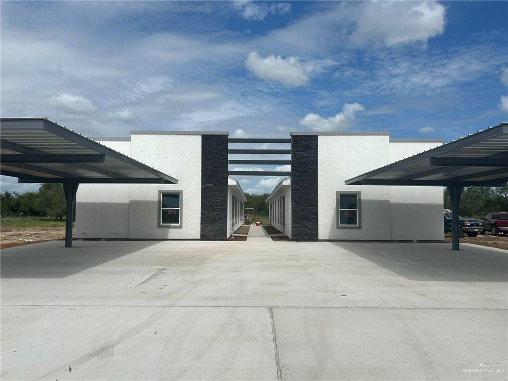 a view of the house with garage