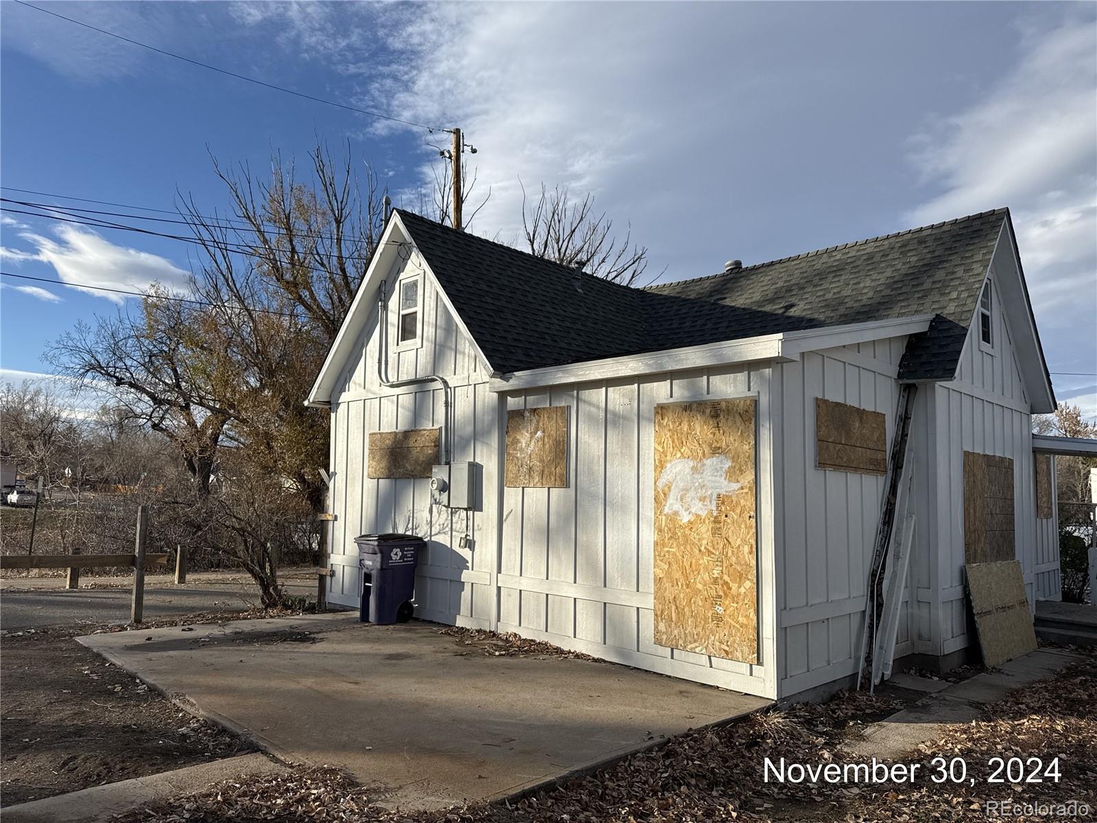 a view of a house with a street