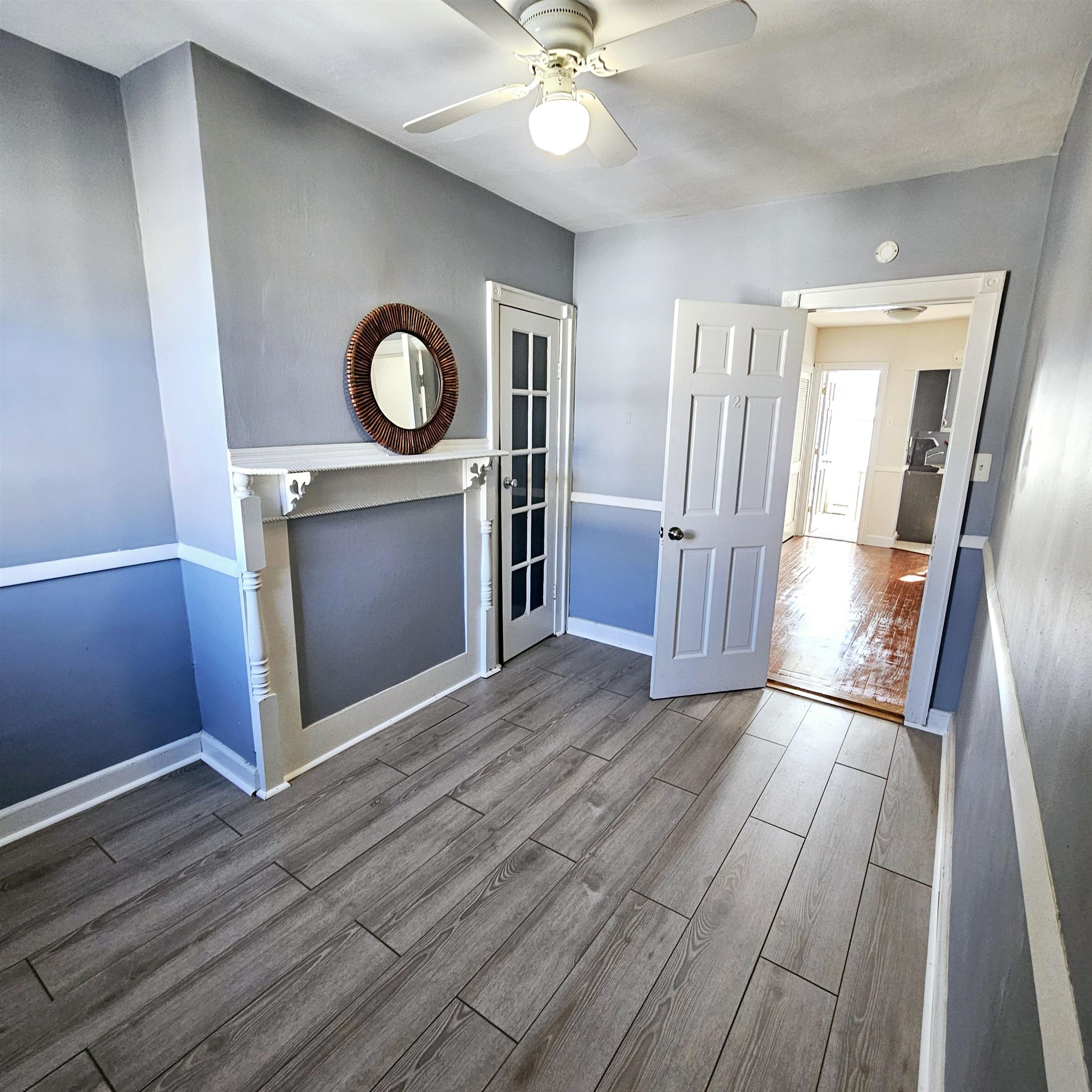 a view of a livingroom with wooden floor